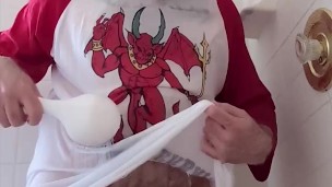 Demon soaks shirt in shower clip.