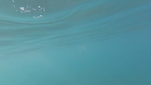 Aquatica's feet melted in the blue sea