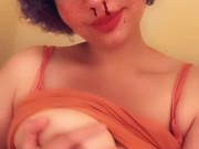 Kitty slut plays with her big boobs