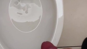 Cumming in public toilet