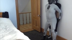 guy in bastard wetsuit captures masked thief sex doll thief