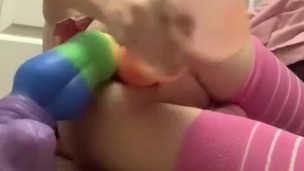 Cute femboy takes two cocks at once