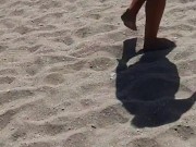 Sexy girl walking naked on the beach - she loves showing off