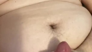 Chubby boy cums over fat tits