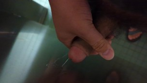 Hung bear jerks off in university restroom stall, blows big sticky load on the wall