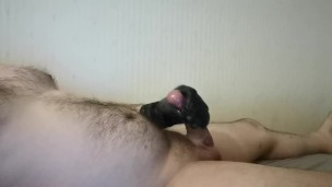 Jerk with a latex glove until ejaculation