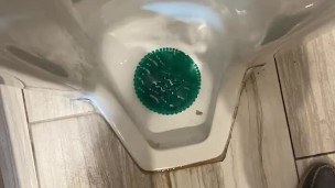 Taking A Leak In A Tall Urinal At A Gas Station