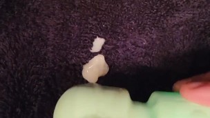 Cumshot using vibrator on soft cock