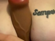 Big fat  dildo between these huge tits 1/16