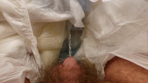 Chubby bear flooding his diaper