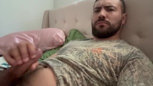 Beefy stud shows his thick cock and cum