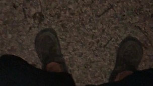 Putting out whats left of the campfire at the end of the night by taking a piss before bed