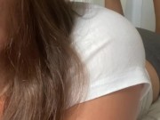 woman showing her feet relaxing on bed 14/16