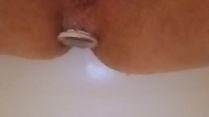 Close up making kitty squirt anal plug