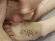 I come to jerk off on her feet and cum on her small tits while she watches TV 8/16