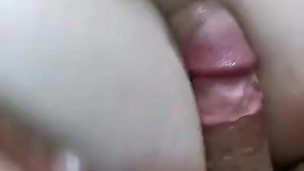 Moviendo las tetas en la verga de mi esposo