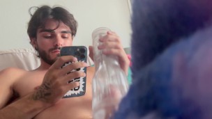 sticking cock in fleshlight in bed