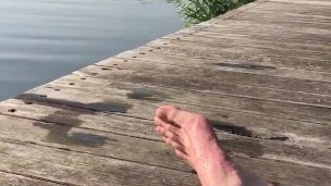 Naked dick relaxing outdoors public