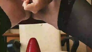 Anal stretching while wearing stockings and silk dress