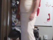 Beautiful blonde bride dangling her long legs in her almost knee high boots 1/16