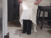 Beautiful blonde bride dangling her long legs in her almost knee high boots 6/16