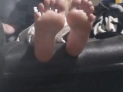 Just a girl relaxing in the recliner watching tv enjoying a cigarette 4/16