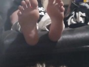 Just a girl relaxing in the recliner watching tv enjoying a cigarette 5/16