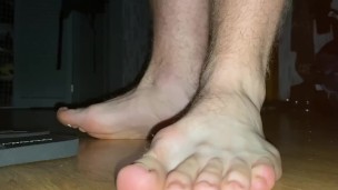 Giant boy in flip flops