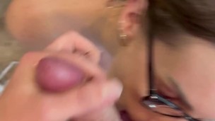 she licks my balls and I cum on her glasses