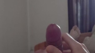 Alone in my bedroom, I give myself a quick handjob while lying on the bed. Mobile POV twink wanks