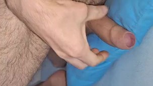 Tease by pillow with pretty foot
