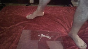 FETISH - I trample a dildo with my boots and after a handjob I play with my feet and my cum.