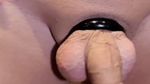 There are at least two ways to put a cock ring on...