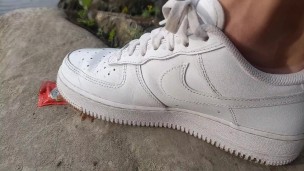 Boy crushes a ketchup packet with his new white sneakers Nike Air Force One AF1 sockless foot fetish
