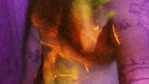 Glow in the dark painted hairy jock jerks and cums