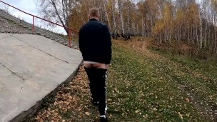 guy jerks off his dick under a traffic junction