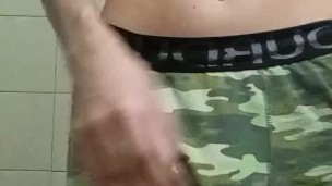 Young skinny man shows his body