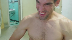 Fitness enthusiast guy makes crazy faces while enjoying and reaching orgasm