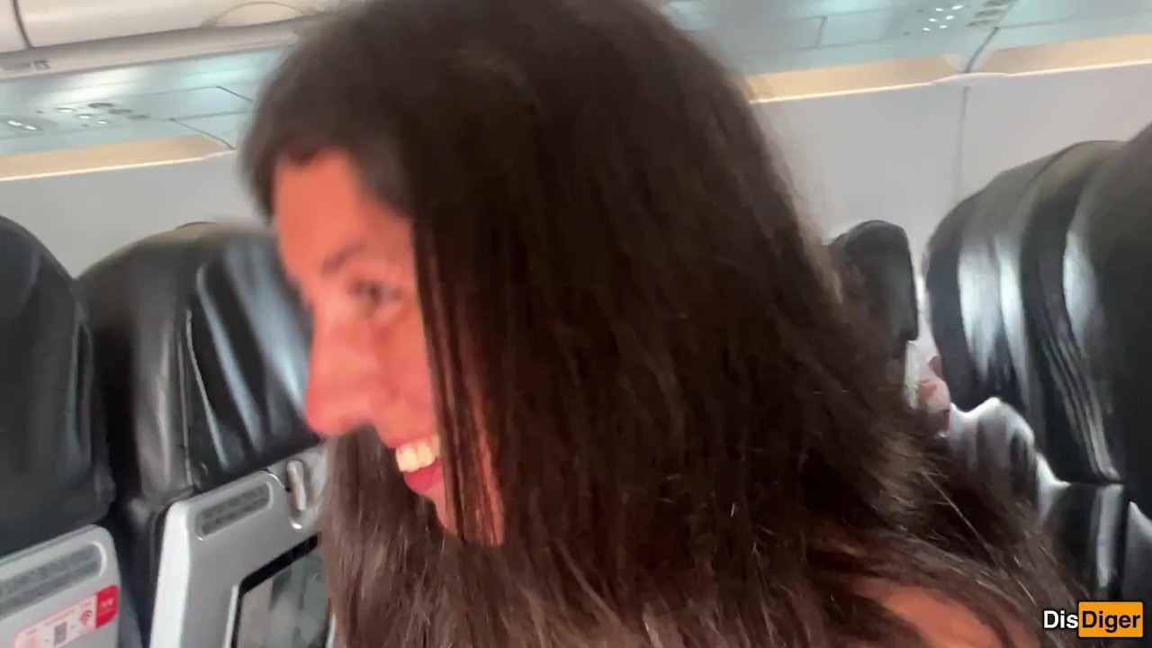 Risky public blowjob on a plane - we got caught! - RedTube