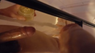 Nude twink wanks his big hard dick with an oiled Fleshlight, cums on a mirror, moans in the bathroom
