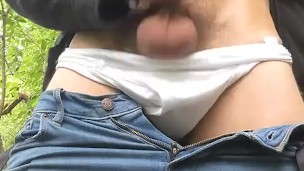 Pulling fat uncut cock from tighty whiteys to smackit outside in the woods at a public park
