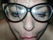 Sexy stepmom with long hair sucks a big cock and smokes a cigarette on her knees 12/16