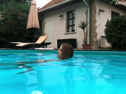 Hungarian petite skinny babe Hermione nude in pool