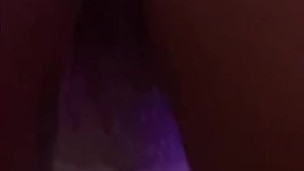 Beauty in red shorts shows off her legs in stripes