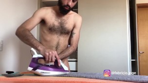 HOMEOWNER IRONING CLOTHES TO GO TO WORK