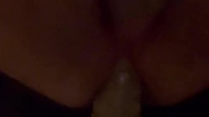 Slave riding a HUGE Dildo