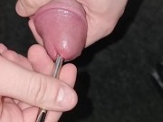 Inserting a small dilator fully into my penis, then pushing it deeper and deeper (all the way in)