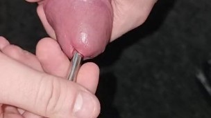 Inserting a small dilator fully into my penis, then pushing it deeper and deeper (all the way in)