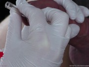Perfect extraction of sperm directly from the urethra. Close-up of the glass straw sounding. 9/16