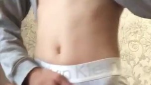 Handsome guy undresses sexy on camera